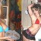 Illustration for article titled Dinosaurs + Confused Bikini Models = The Internets New Strangest Site